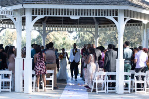 Bride and groom walking up aisle