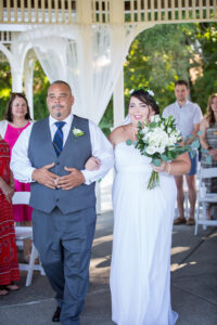 Father of Bride and Bride walking down aisle