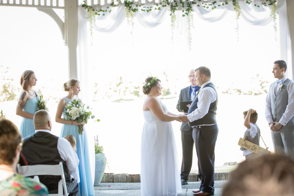 Bride and Groom in front of pastor